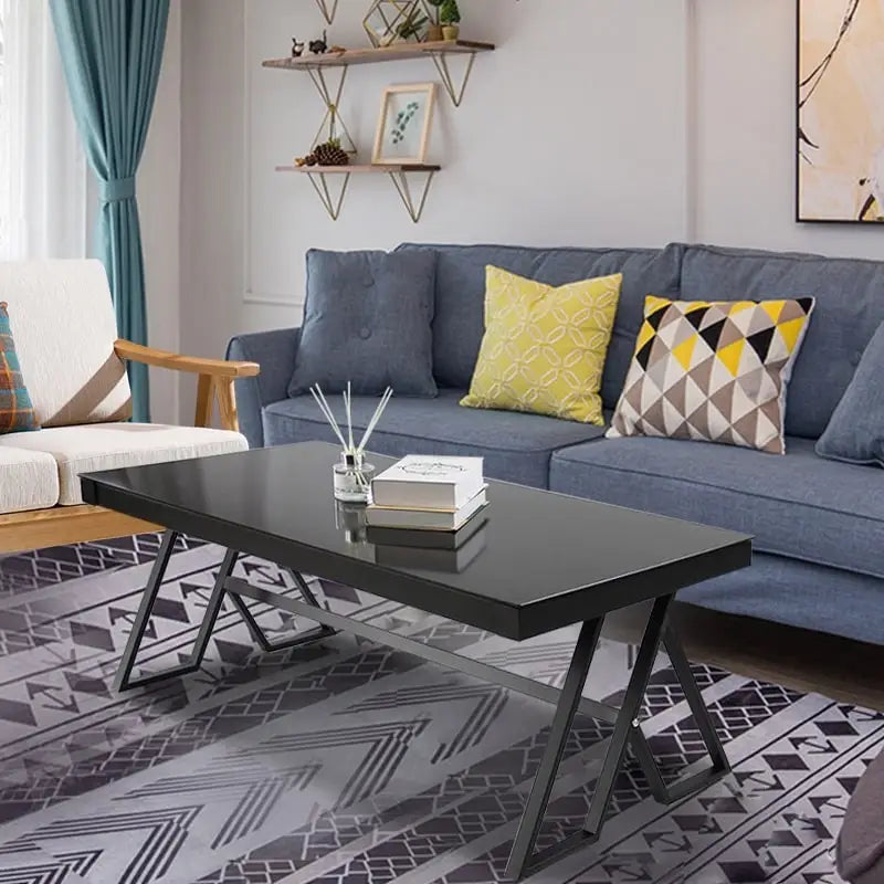 Table basse de salon avec plateau en verre trempé et structure métallique ajourée (46 pouces)